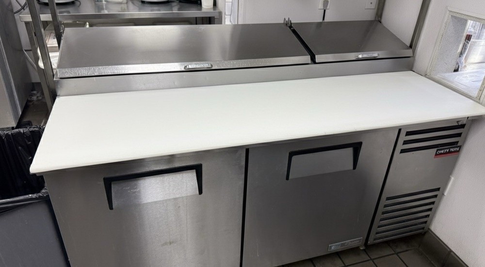 True TPP-AT-67-HC 67″W Solid Door Refrigerated Pizza Prep Table