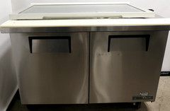 True TSSU-48-18M-B-FGLID-HC 48″ Mega Top Sandwich/Salad Prep Table w/ 2 Doors